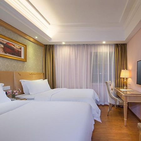 גואנגג'ואו Vienna 3 Best Hotel Exhibition Center Chigang Road מראה חיצוני תמונה